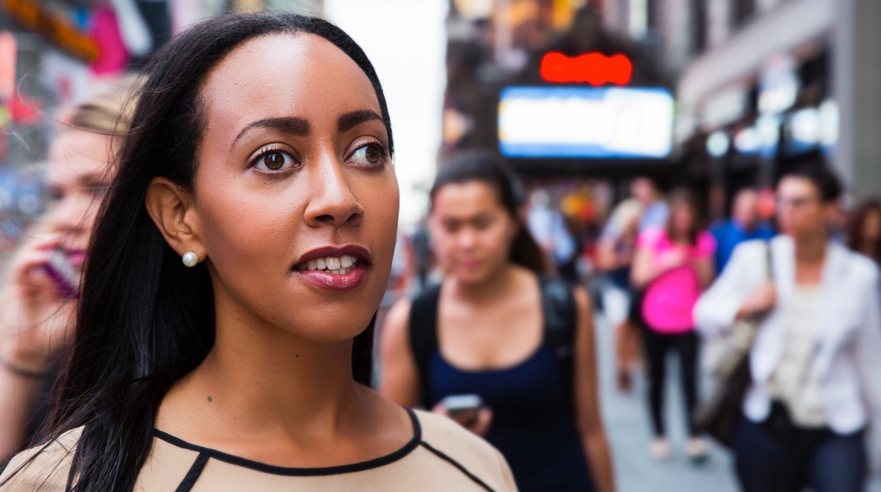 Haben Girma, a woman of color with long dark hair.