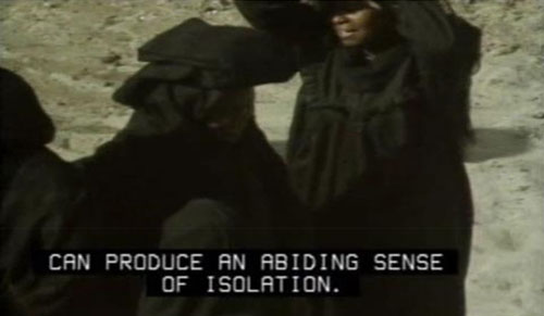 Video with captions. Captions are white over transparent gray background, upper and lower case.