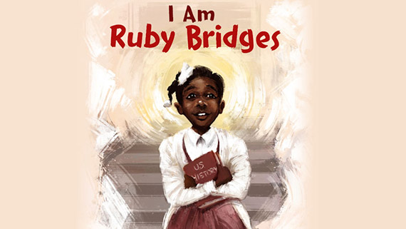 Book cover illustration shows a young black girl wearing a dress and a white sweater and hair ribbon. Words say I am Ruby Bridges