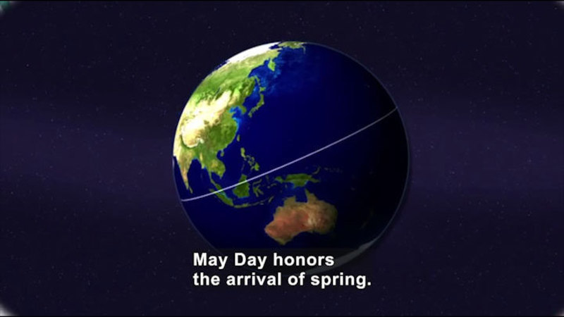 Illustration of the Earth from space with the equator marked on the globe. Caption: May Day honors the arrival of spring.