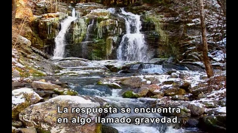 Gentle waterfall. Spanish captions.