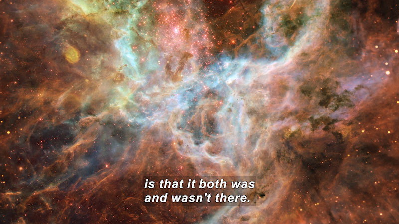 Galaxy filled with swirling stars. Caption: is that it both was and wasn't there. 