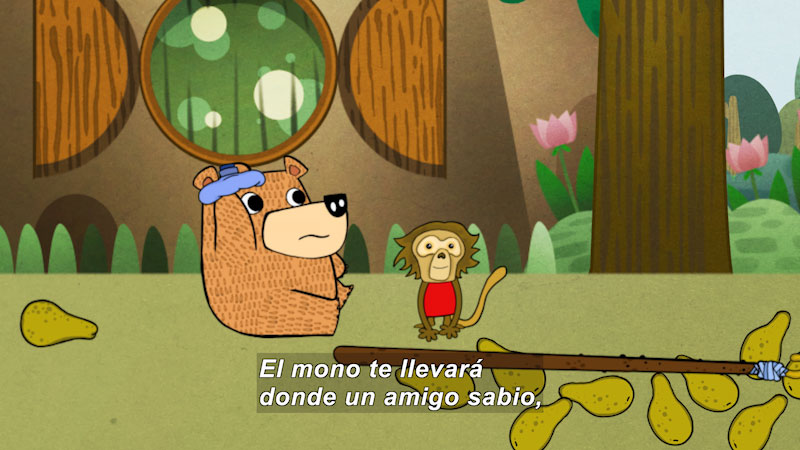 Cartoon of a bear and a monkey outside a house in a forest setting. A stick with a hook lays on the ground in a pile of fallen fruit. Spanish captions.