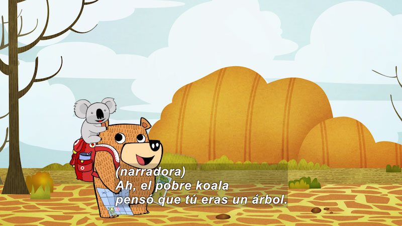 Cartoon of a bear wearing a backpack and holding a map with a koala in a desert setting. Spanish captions.