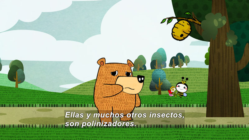 Cartoon of a bear standing next to a tree with a beehive. A bee hovers in the air and holds flowers. Spanish captions.