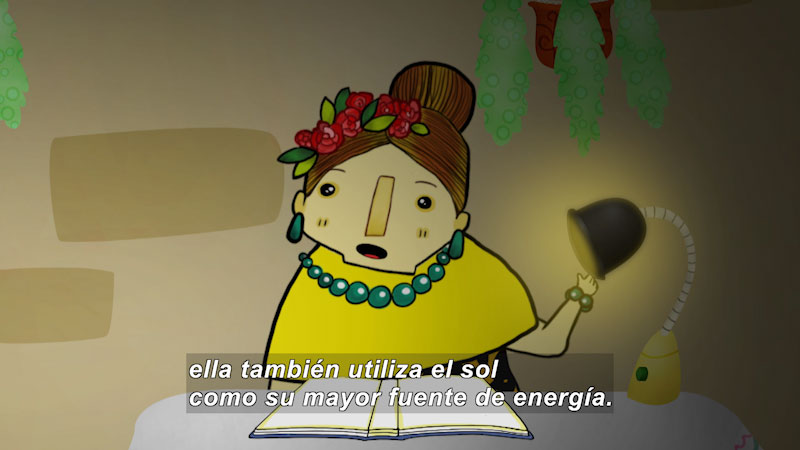 Cartoon of a woman sitting at a desk with an open book in front of her. Spanish captions.