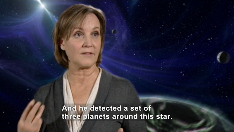 Person speaking in front of a background showing planets and space. Caption: And he detected a set of three planets around this star.