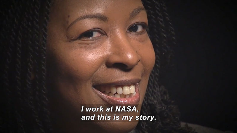 Woman speaking. Caption: I work at NASA, and this is my story.