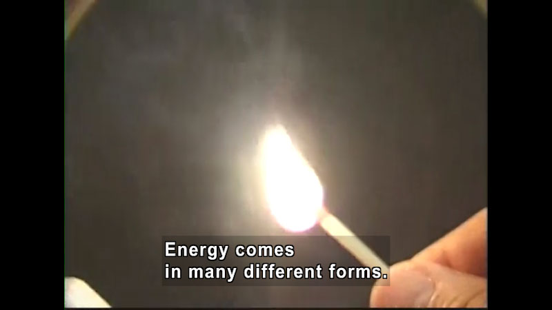A lit match. Caption: Energy comes in many different forms.