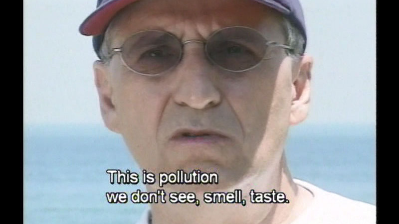 Closeup of a person's face. Caption: This is pollution we don't see, smell, taste.
