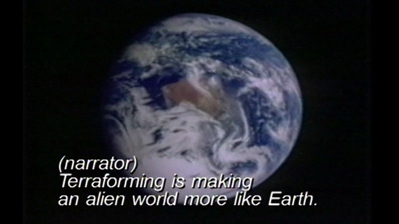 Earth as seen from space. Caption: (narrator) Terraforming is making an alien world more like Earth.