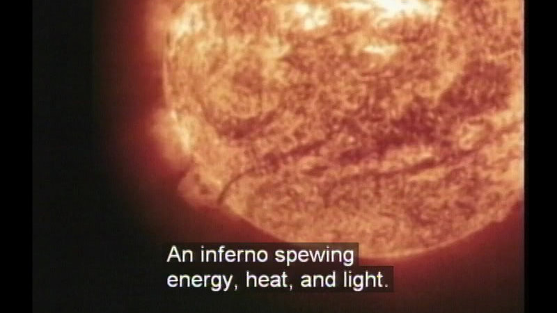 Glowing ball of the sun with heat visibly radiating off it. Caption: An inferno spewing energy, heat, and light.