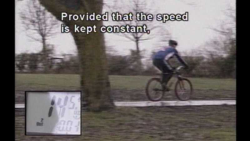 Person riding a bike and measuring 14.5 mph. Caption: Provided that the speed is kept constant,