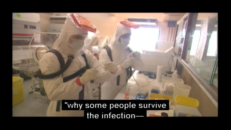 People in full biohazard contamination suits working in a science lab. Caption: "why some people survive the infection -