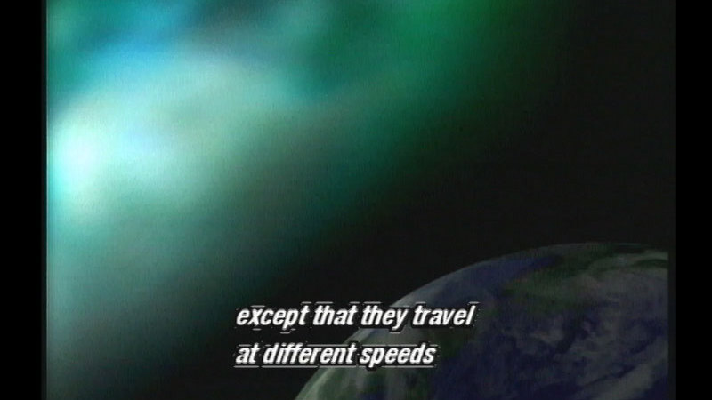 Planet Earth with nebulous green and blue light coming towards it. Caption: except that they travel at different speeds