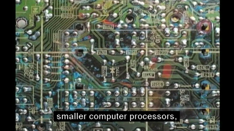 Closeup of a circuit board. Caption: smaller computer processors,