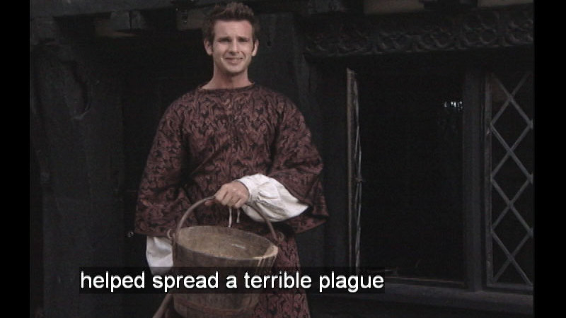 Man holding a wooden bucket. Caption: helped spread a terrible plague