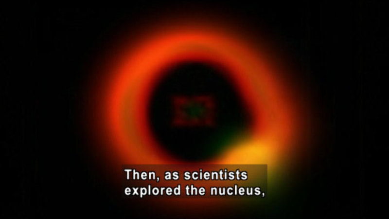 Out of focus image of a spherical object surrounded in glowing light. Caption: Then, as scientists explored the nucleus,