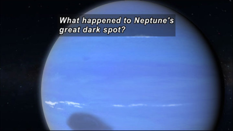 Close up view of Neptune in space. Caption: What happened to Neptune's great dark spot?