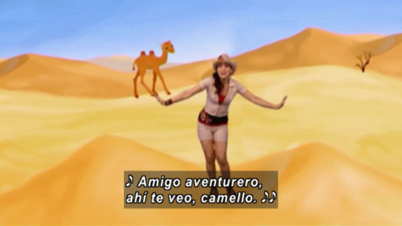 A woman against an illustrated backdrop of sand dunes and a camel. Spanish captions