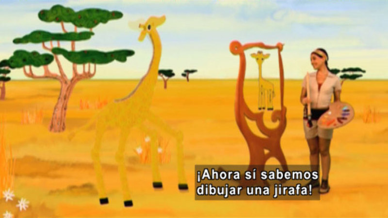 A woman with a paintbrush and a pallet. On her canvas and around her are illustrated giraffes. Spanish captions.