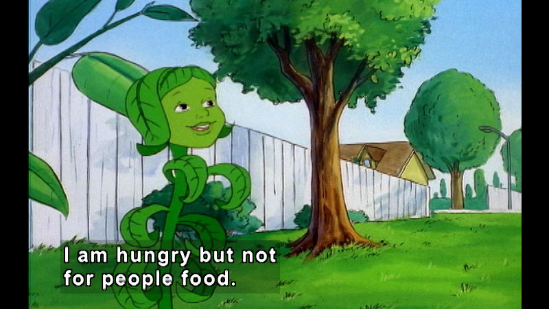Cartoon of a plant with a face in a yard. Caption: I am hungry but not for people food.