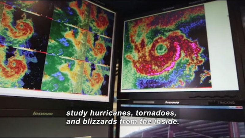 Computer screens with color-shaded images of a spiral shaped storm. Caption: study hurricanes, tornadoes, and blizzards from the inside.