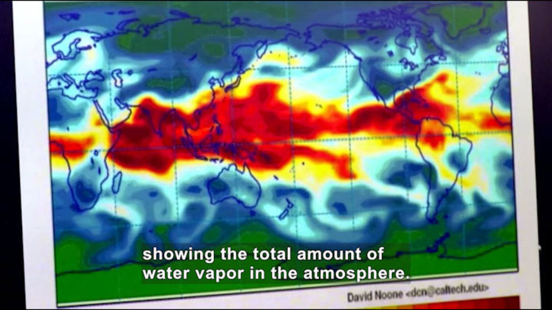 Color gradients showing the amount of water vapors over a map of the earth. Caption: showing the total amount of water vapor in the atmosphere.