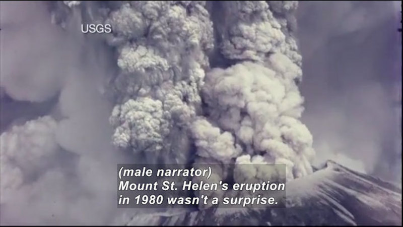 Volcano billowing smoke and ash. Caption: (male narrator) Mount St. Helen's eruption in 1980 wasn't a surprise.
