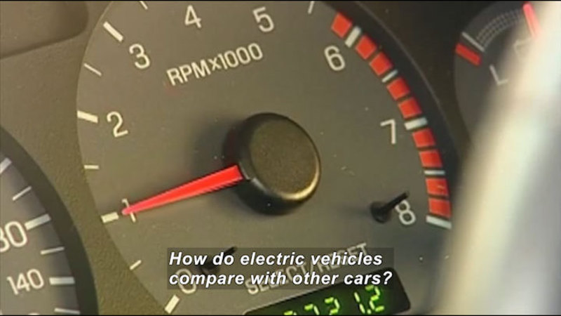 Gauge in a vehicle with a range of 0 to 8. The indicator is at 1 and the gauge is labeled RPMx1000. Caption: How do electric vehicles compare with other cars?