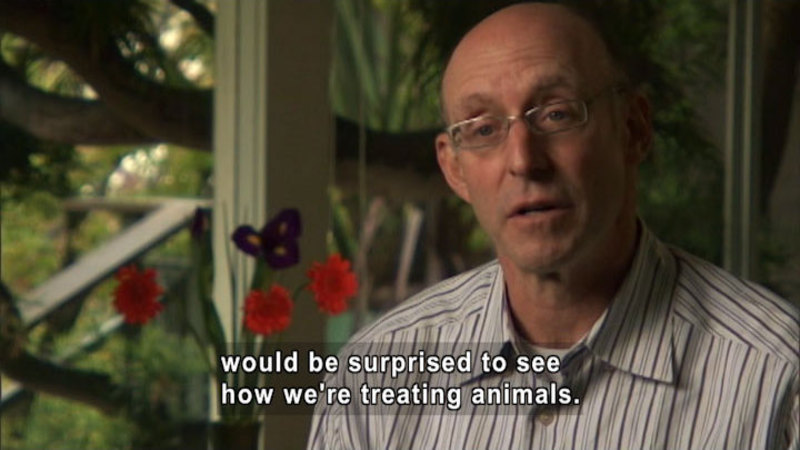 A man speaking. Caption: would be surprised to see how we're treating animals.