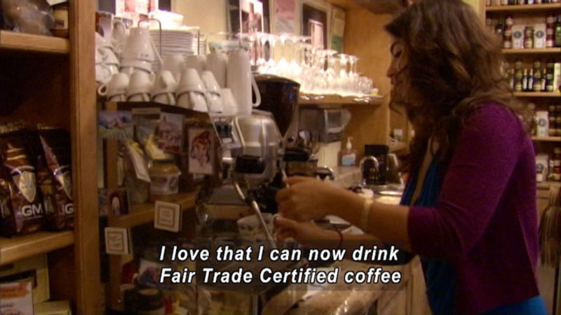Person at an expresso machine in a shop. Caption: I love that I can now drink Fair Trade Certified coffee