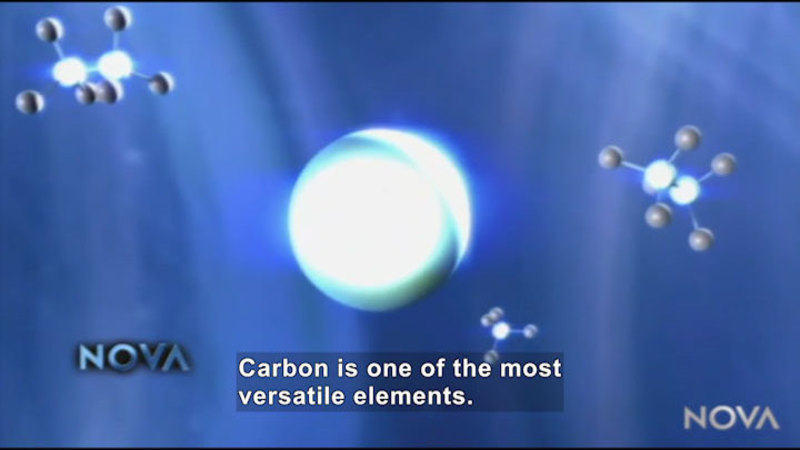 Large spherical object surrounded by smaller multi-sphere objects. Nova Caption: Carbon is one of the most versatile elements.