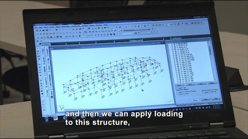 Computer screen displaying a grid-like diagram mapping connections between multiple points. Caption: and then we can apply loading to this structure,
